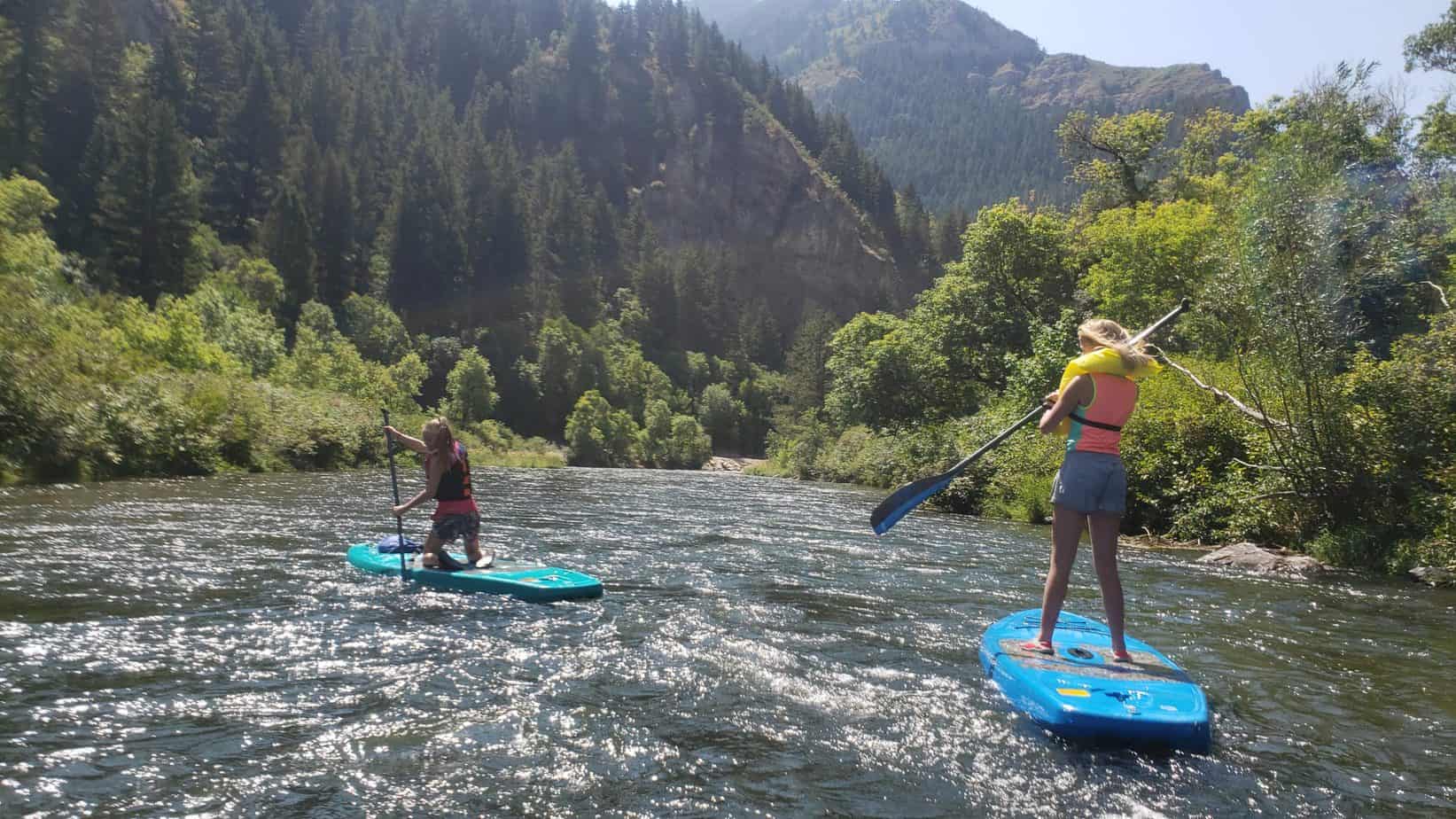 paddle boarding down provo river